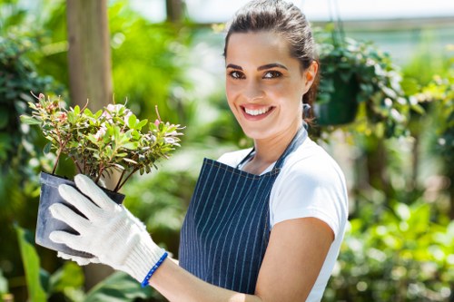 Green waste and rubbish being handled safely during landscaping work